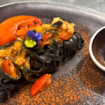 Tagliatelle al nero di seppia, astice e caviale